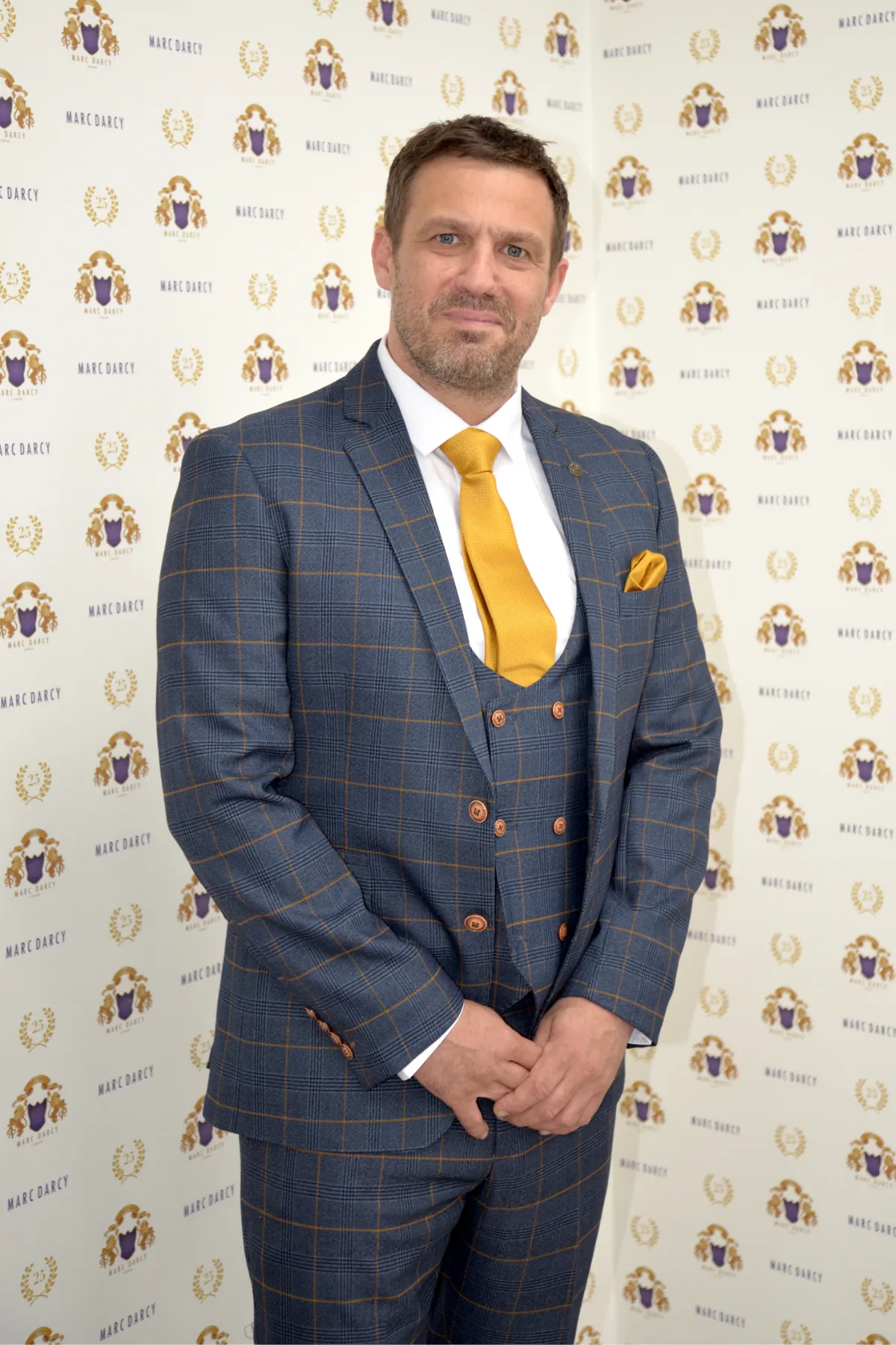 Actor Jamie Lomas in Jenson Marine Check Suit