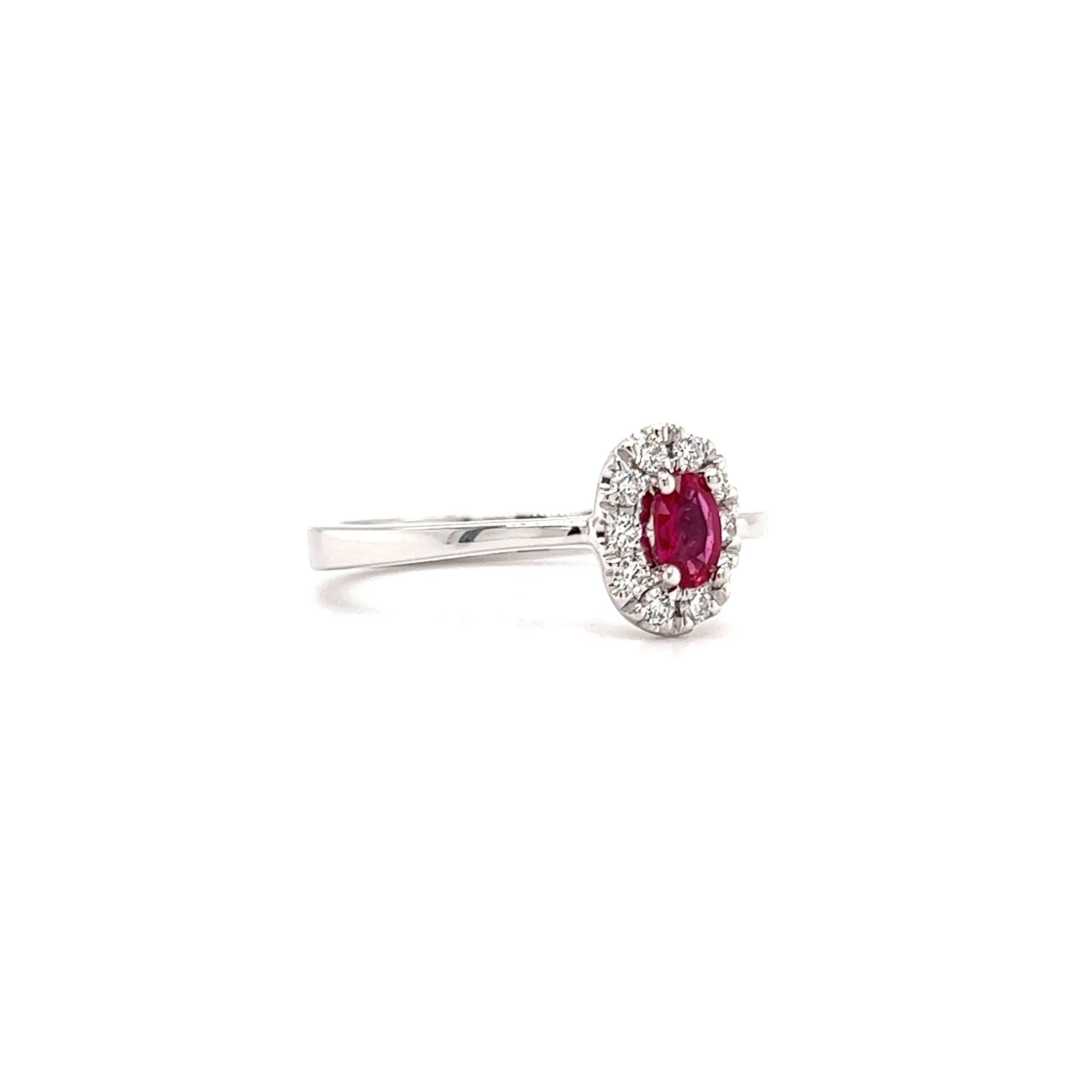 Oval Ruby Ring with Diamond Halo in 14K White Gold