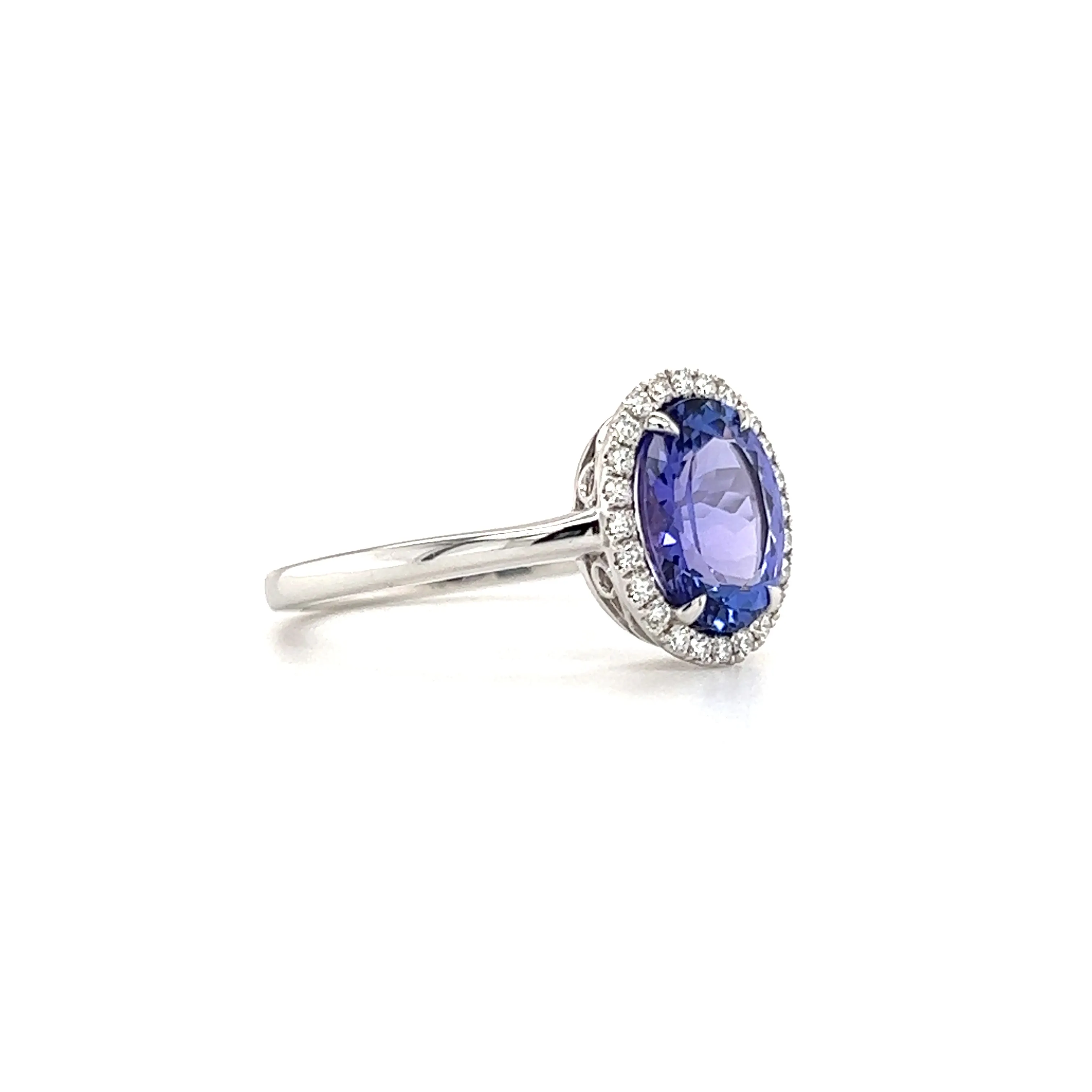 Oval Tanzanite Ring with Diamond Halo in 14K White Gold