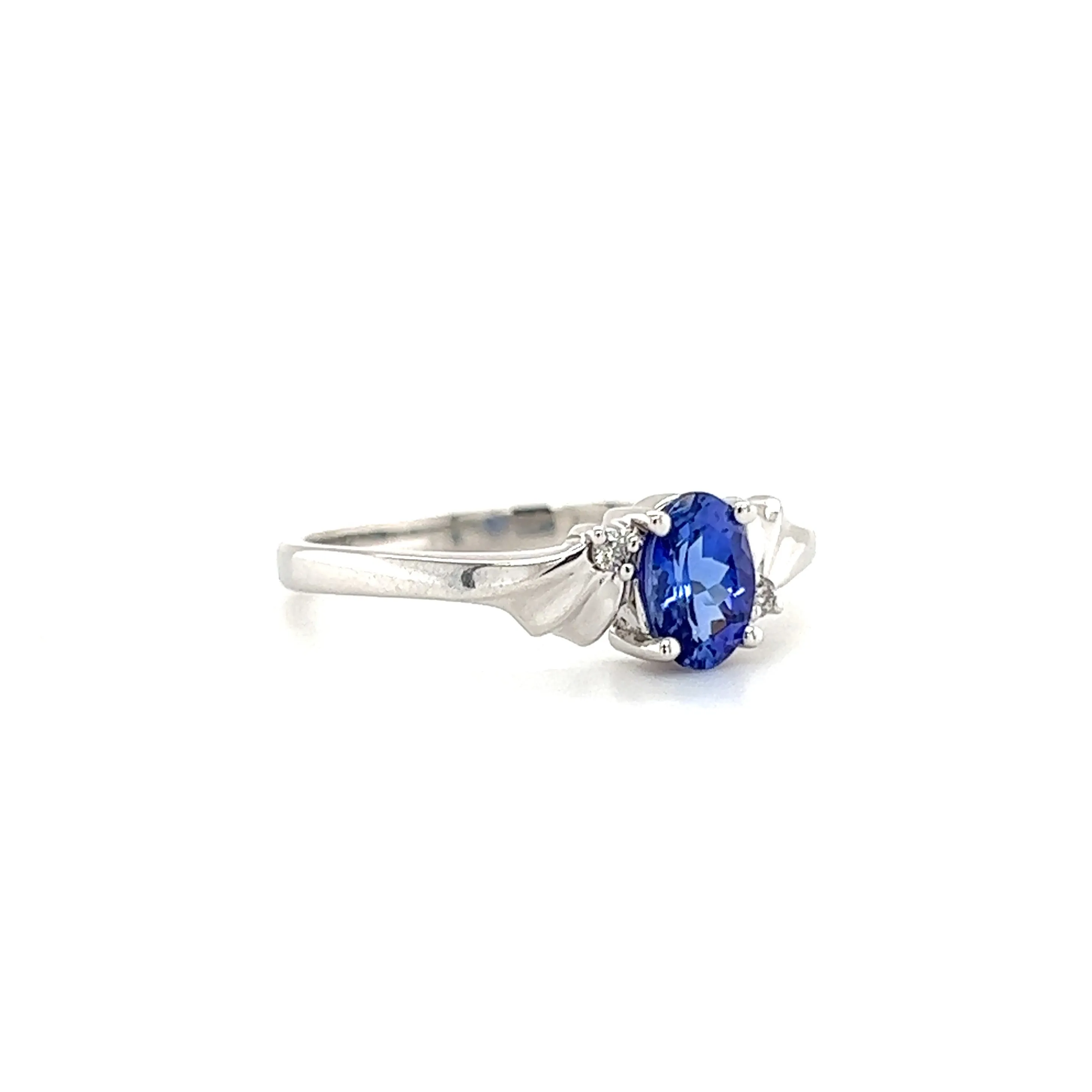 Oval Tanzanite Ring with Two Side Diamonds in 14K White Gold