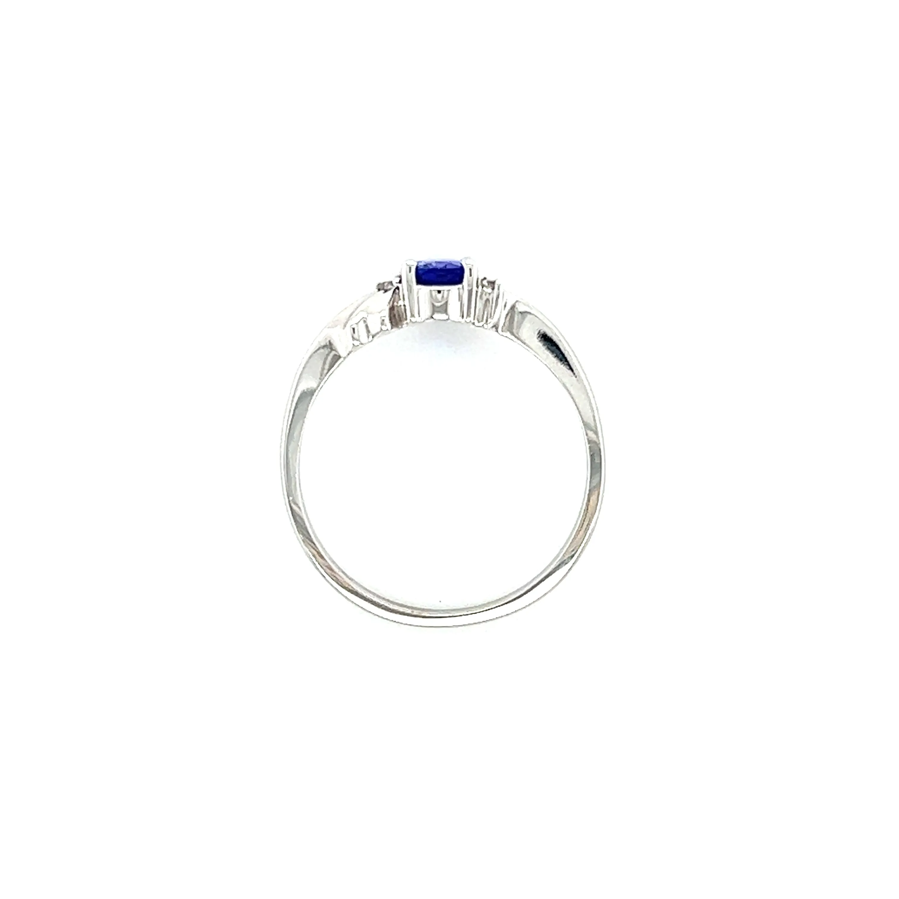 Oval Tanzanite Ring with Two Side Diamonds in 14K White Gold