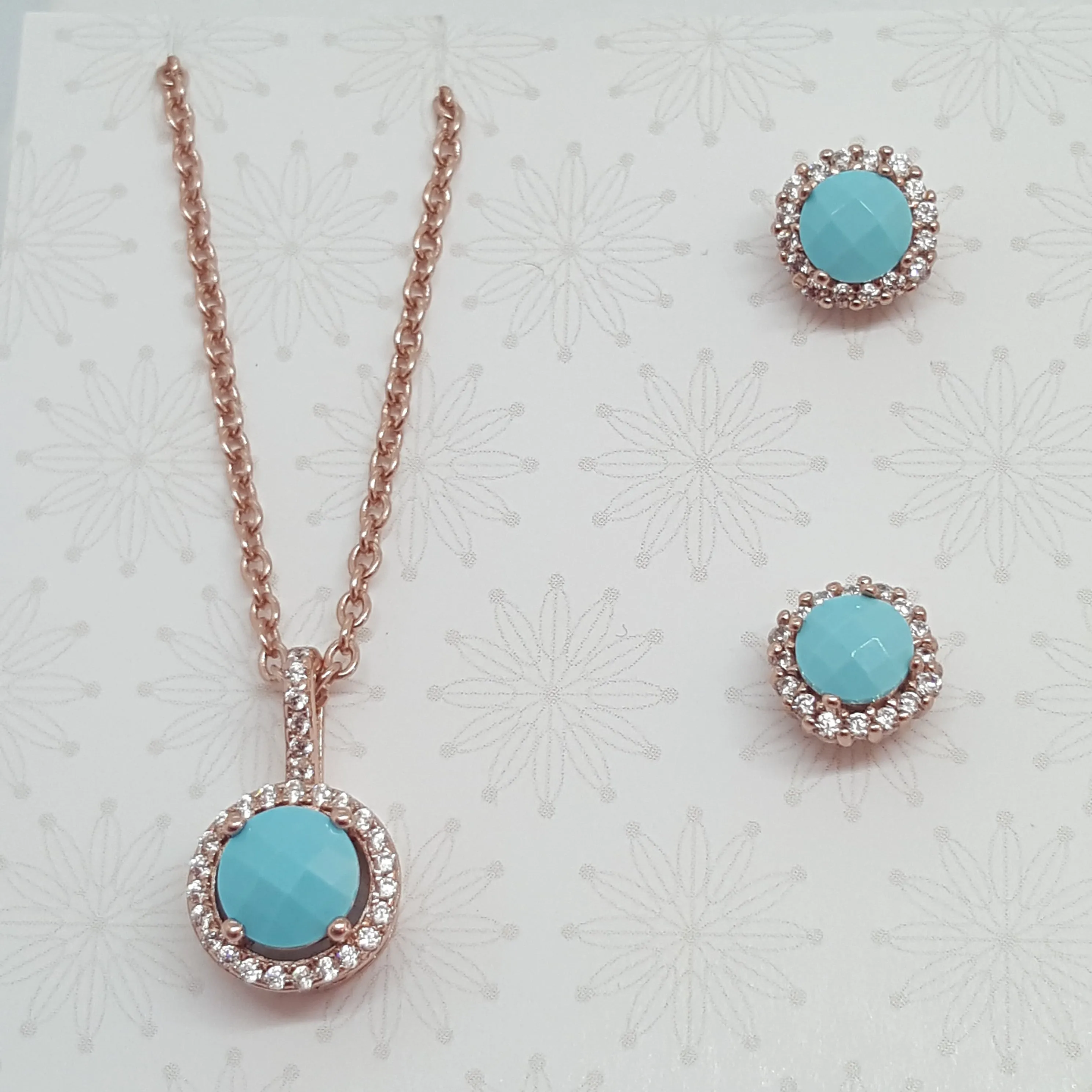 Turquoise and diamond look jewellery set in rose gold