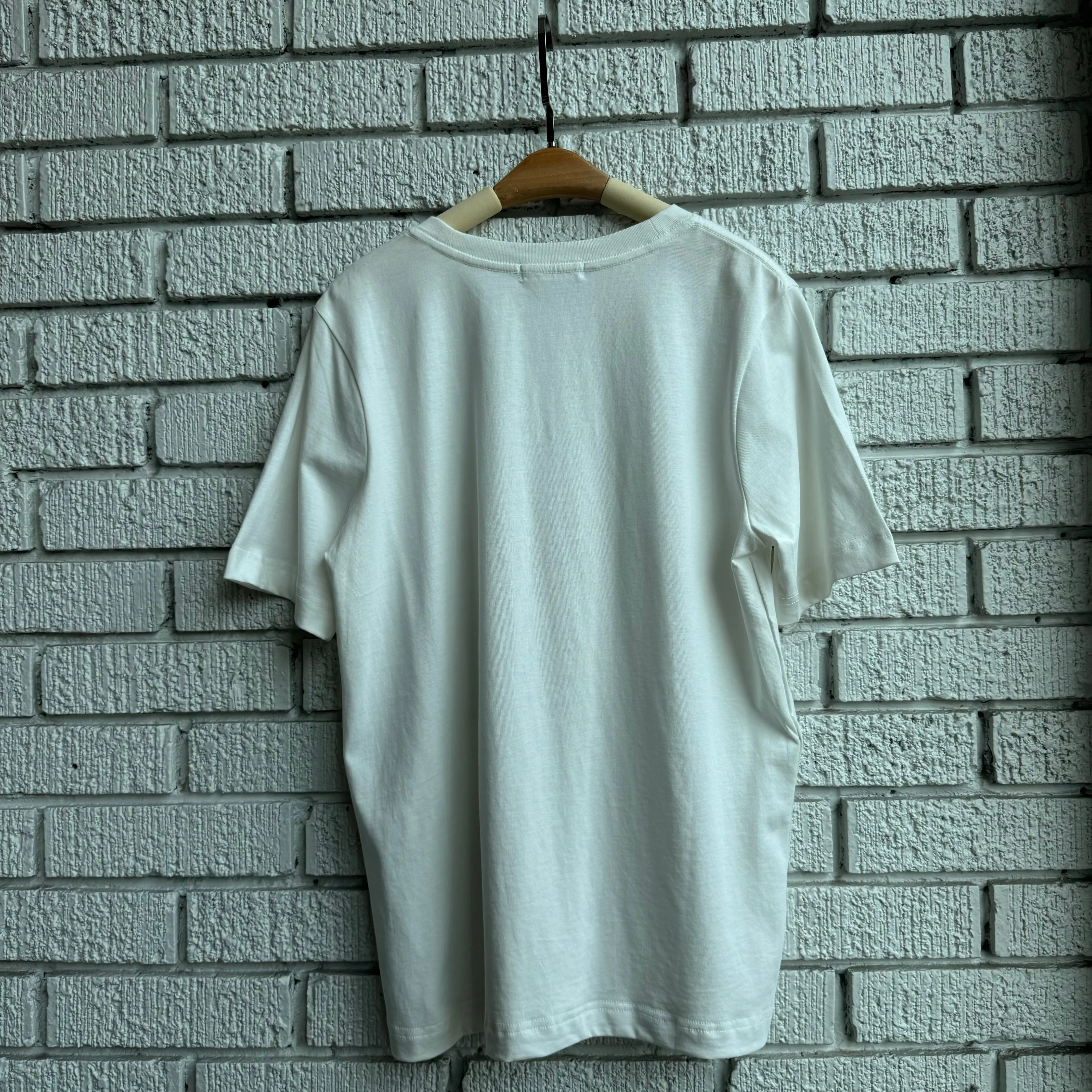 UNWIND Tee