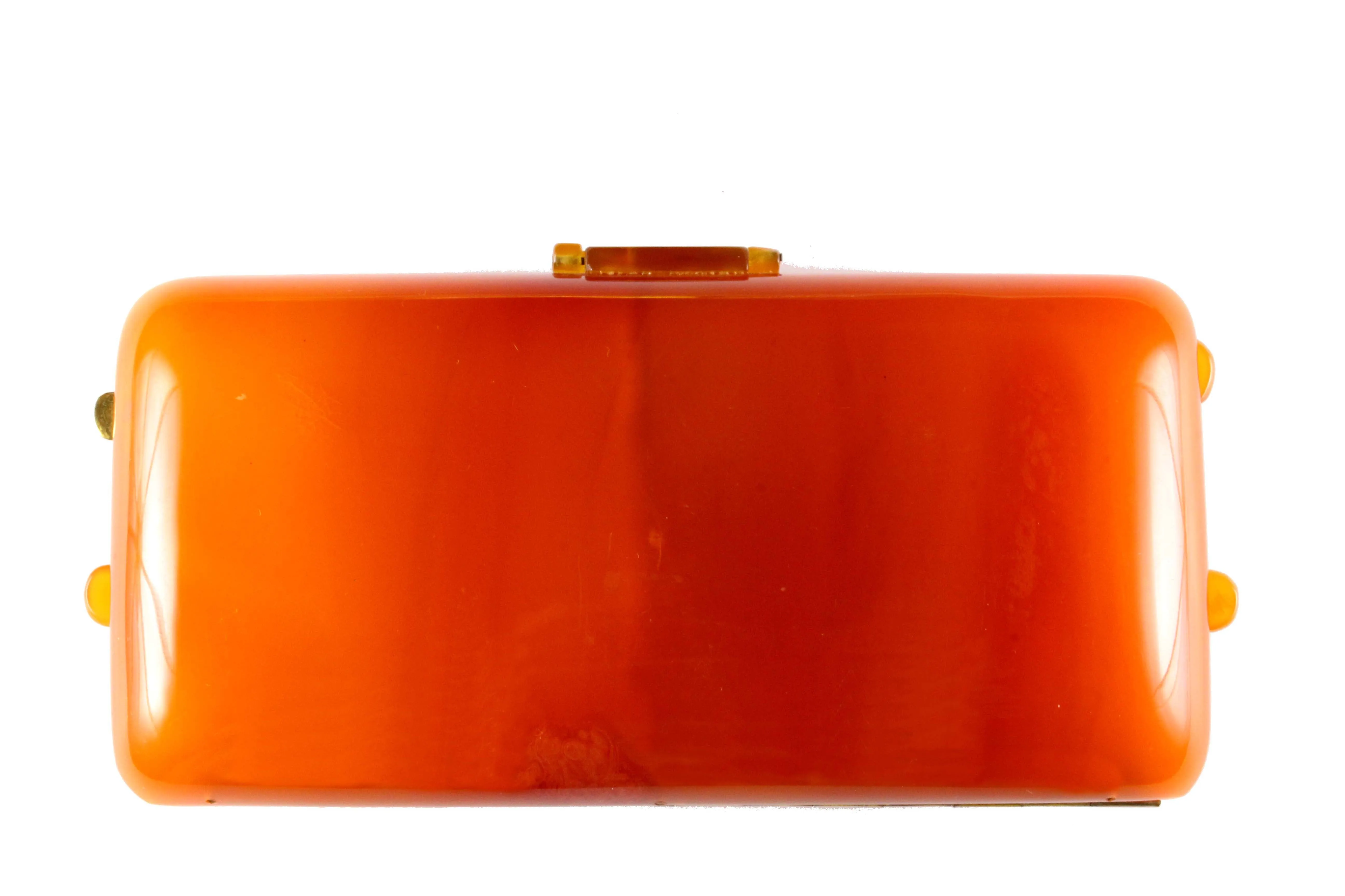 Vintage orange bakelite vanity purse bag